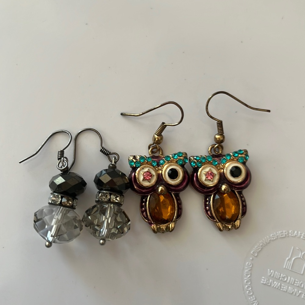 Two set of earrings beautiful owls with rhinestone eyes.